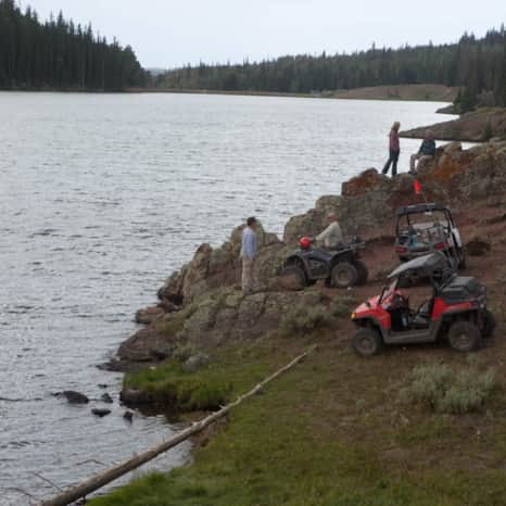 Stopping for a break at a lake along the Paiute Trail