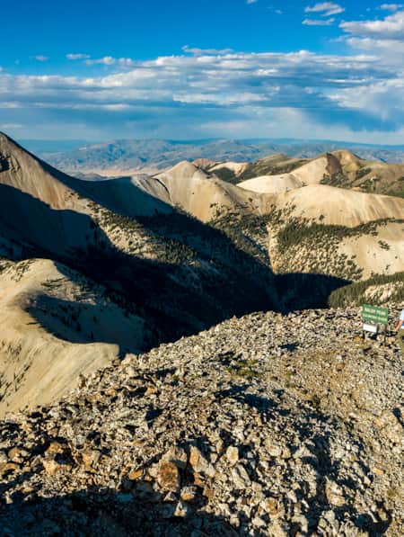 A range of sandy and rocky mountain peaks.
